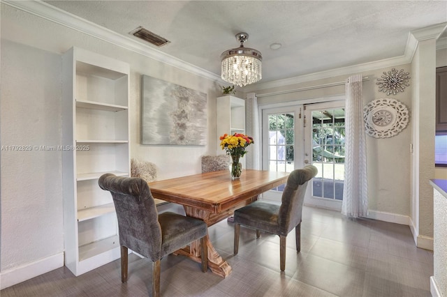 11450 NW 45th Pl, Sunrise, FL 33323 - dining room with visible vents, built in features, baseboards, an inviting chandelier, and ornamental molding