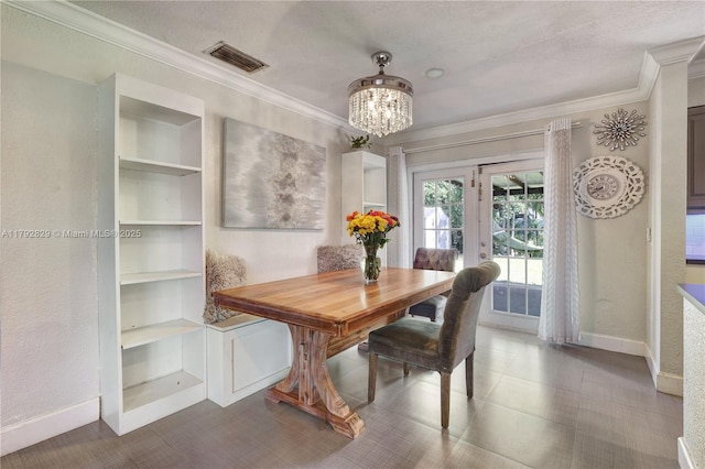 11450 NW 45th Pl, Sunrise, FL 33323 - dining area featuring crown molding, an inviting chandelier, built in shelves, baseboards, and visible vents