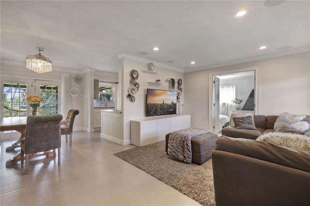 11450 NW 45th Pl, Sunrise, FL 33323 - living area featuring crown molding, a notable chandelier, recessed lighting, baseboards, and light floors