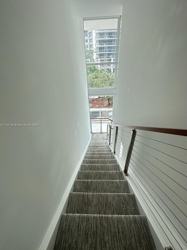 stairway with baseboards