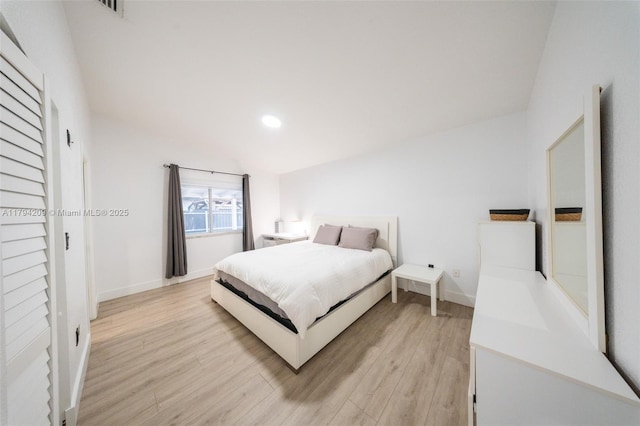 bedroom featuring recessed lighting, baseboards, light wood finished floors, and visible vents