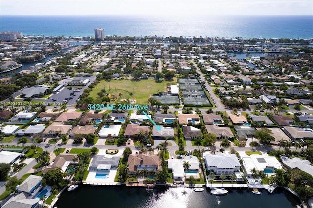 aerial view featuring a residential view and a water view