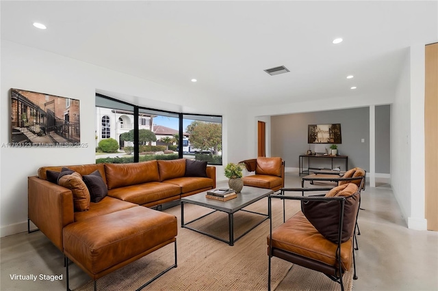 living area with recessed lighting, baseboards, visible vents, and finished concrete floors