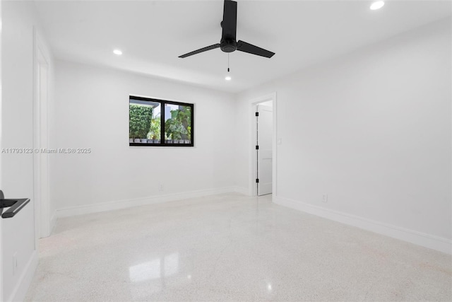 empty room featuring recessed lighting, a ceiling fan, and baseboards