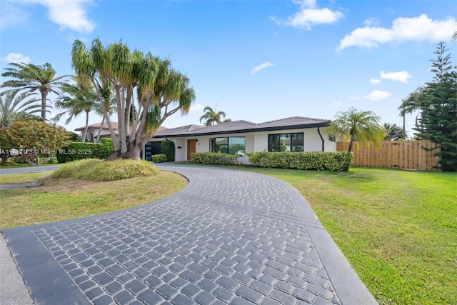 3420 NE 26th Ave, Lighthouse Point, FL 33064 - single story home with curved driveway and stucco siding