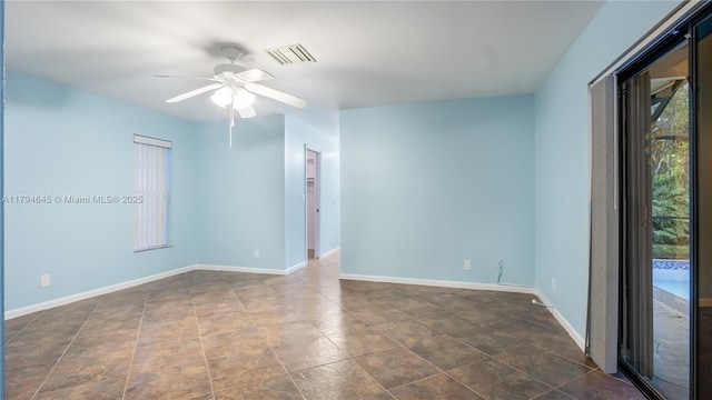 9866 NW 19th St, Coral Springs, FL 33071 - spare room featuring a ceiling fan, baseboards, and visible vents