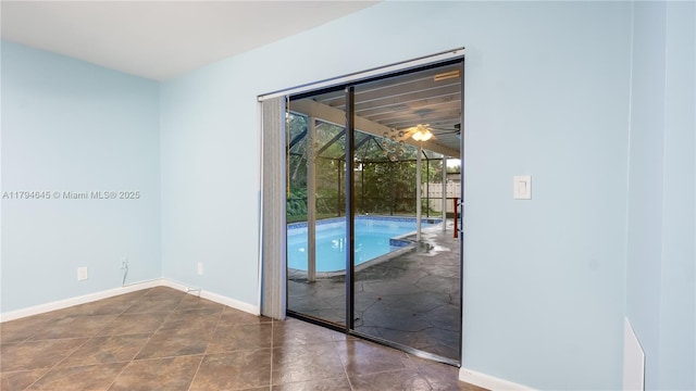 9866 NW 19th St, Coral Springs, FL 33071 - doorway with baseboards and a ceiling fan