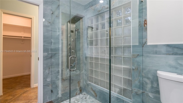 9866 NW 19th St, Coral Springs, FL 33071 - bathroom with toilet, tile patterned floors, a spacious closet, and a stall shower