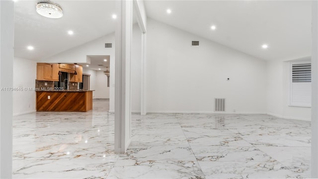 9866 NW 19th St, Coral Springs, FL 33071 - unfurnished living room featuring high vaulted ceiling, visible vents, and marble finish floor