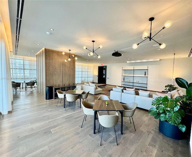 601 NE 1st Ave Unit 3108, Miami, FL 33132 - dining room with recessed lighting, wood finished floors, and a notable chandelier
