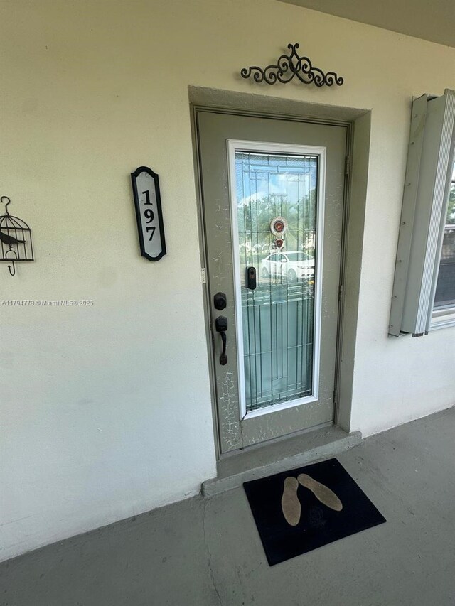 197 Kent L, West Palm Beach, FL 33417 - entrance to property with stucco siding