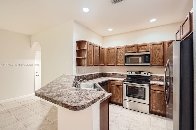 13945 SW 279th Ln, Homestead, FL 33032 - kitchen featuring open shelves, appliances with stainless steel finishes, a sink, a peninsula, and light tile patterned floors
