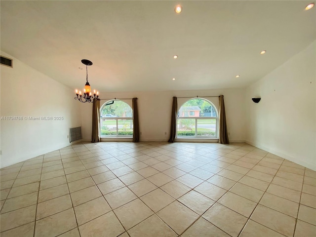 spare room featuring visible vents, recessed lighting, light tile patterned floors, and a notable chandelier