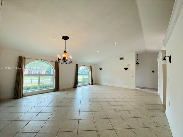 empty room with visible vents, lofted ceiling, light tile patterned flooring, recessed lighting, and a chandelier