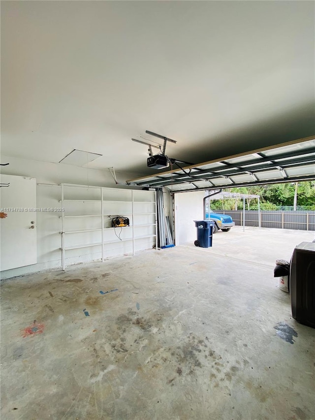 garage featuring a garage door opener