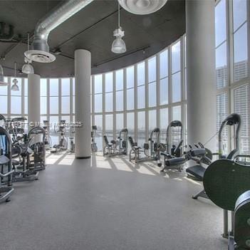gym featuring a high ceiling