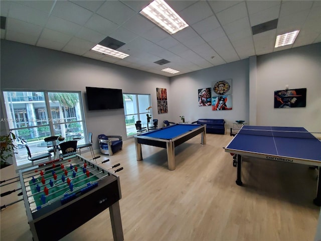 game room with billiards, visible vents, wood finished floors, baseboards, and a drop ceiling
