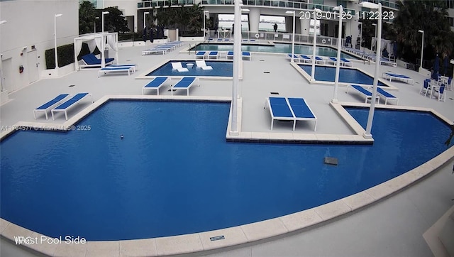 pool featuring a patio