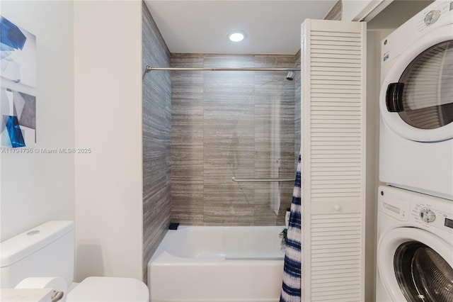 bathroom with toilet, stacked washing maching and dryer, shower / bathtub combination with curtain, and recessed lighting