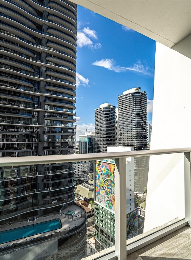 balcony featuring a city view