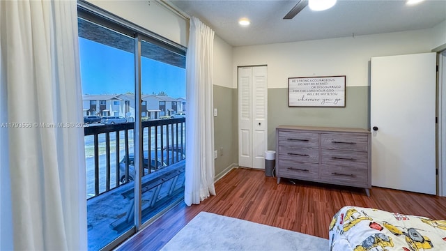 bedroom featuring a ceiling fan, dark wood finished floors, baseboards, access to outside, and recessed lighting