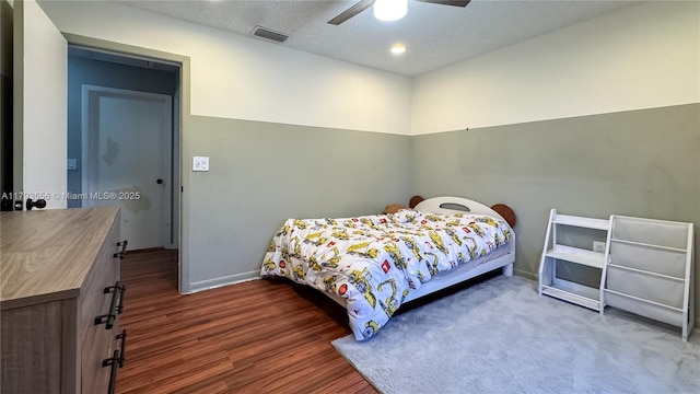 bedroom featuring a ceiling fan, baseboards, recessed lighting, wood finished floors, and visible vents