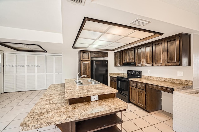 4109 NW 79th Ave, Coral Springs, FL 33065 - kitchen with dark brown cabinetry, visible vents, a sink, black appliances, and light tile patterned flooring