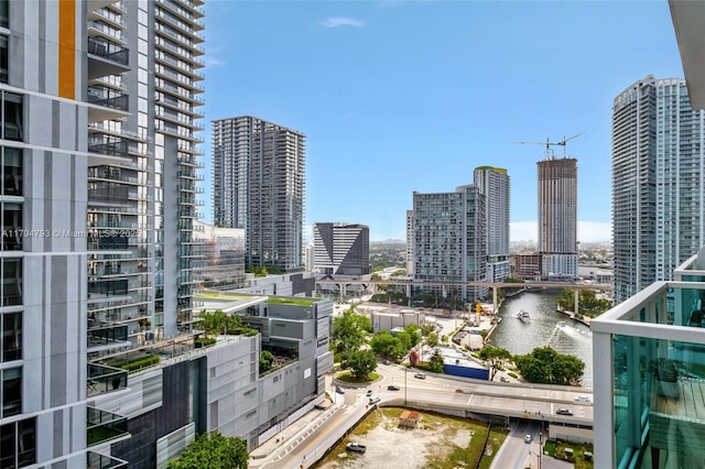 property's view of city featuring a water view