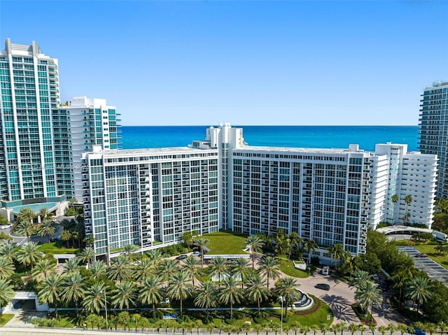 view of property featuring a view of city and a water view