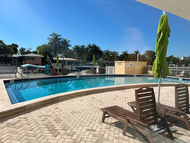 pool featuring fence