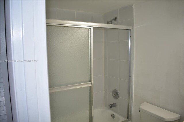 9900 Sunrise Lakes Blvd Unit 309, Sunrise, FL 33322 - full bathroom featuring enclosed tub / shower combo and toilet