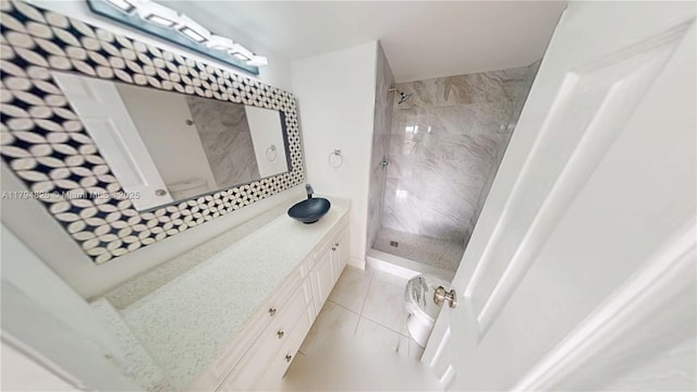 9900 Sunrise Lakes Blvd Unit 309, Sunrise, FL 33322 - full bath featuring a tile shower, vanity, and marble look tiles