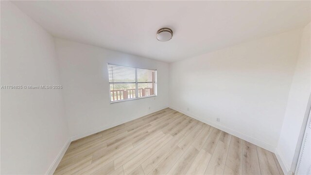 9900 Sunrise Lakes Blvd Unit 309, Sunrise, FL 33322 - empty room featuring light wood-type flooring and baseboards
