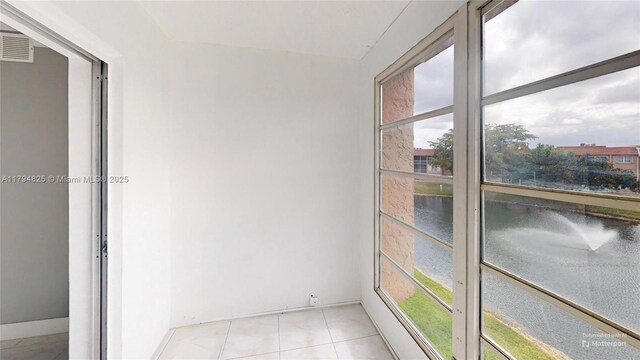 9900 Sunrise Lakes Blvd Unit 309, Sunrise, FL 33322 - unfurnished sunroom with a water view