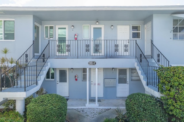 3710 Harrison St Unit 1, Hollywood, FL 33021 - entrance to property with a porch and stucco siding