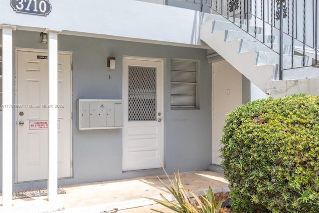 3710 Harrison St Unit 1, Hollywood, FL 33021 - doorway to property with stucco siding