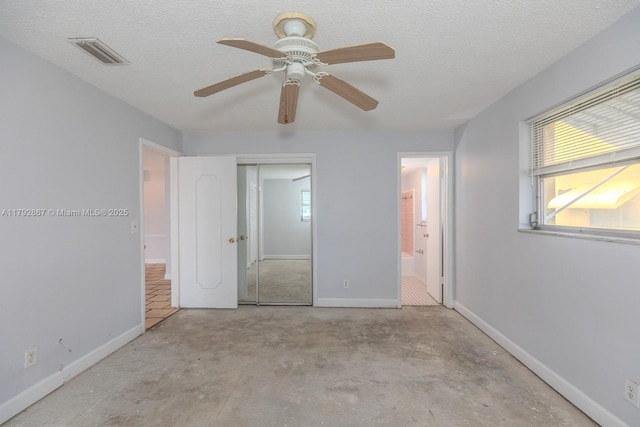 3710 Harrison St Unit 1, Hollywood, FL 33021 - unfurnished bedroom with visible vents, baseboards, a closet, and unfinished concrete flooring
