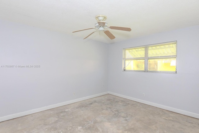 3710 Harrison St Unit 1, Hollywood, FL 33021 - empty room with baseboards, a ceiling fan, and unfinished concrete flooring