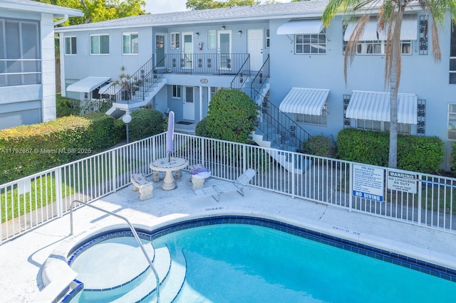 3710 Harrison St Unit 1, Hollywood, FL 33021 - community pool featuring fence, a patio area, and stairway