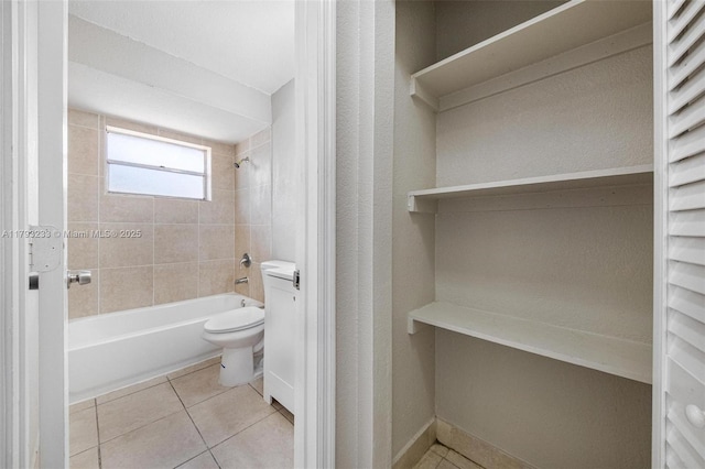 5411 SW 43rd Ter, Dania Beach, FL 33314 - bathroom featuring tile patterned flooring, tub / shower combination, and toilet