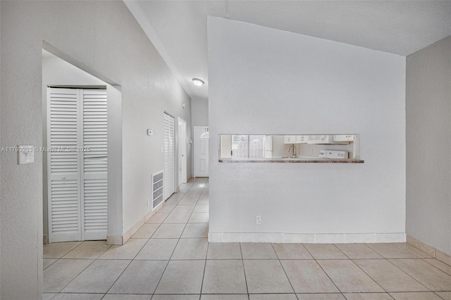 5411 SW 43rd Ter, Dania Beach, FL 33314 - corridor featuring light tile patterned flooring, baseboards, visible vents, and a sink
