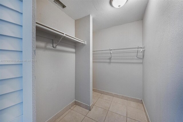 5411 SW 43rd Ter, Dania Beach, FL 33314 - spacious closet with tile patterned floors