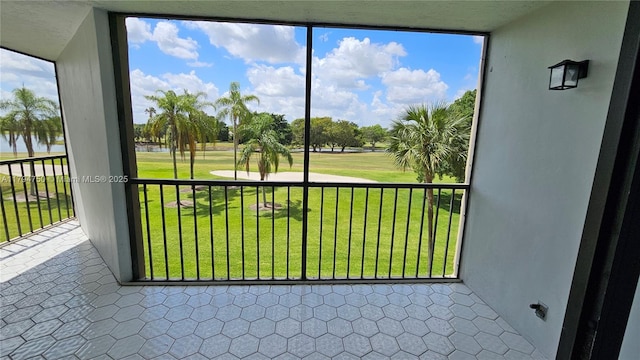 unfurnished sunroom featuring golf course view