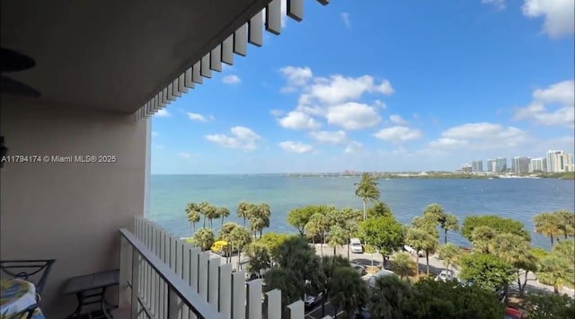 balcony featuring a water view