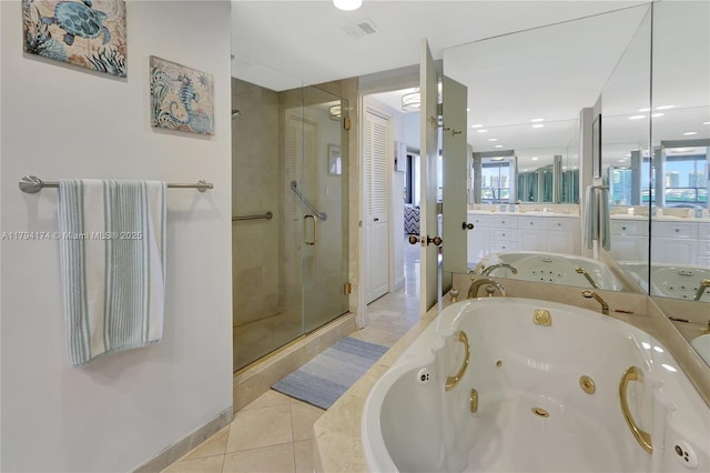 full bathroom with a jetted tub, visible vents, tile patterned flooring, a shower stall, and vanity