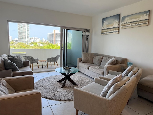 3 Island Ave Unit 07B, Miami Beach, FL 33139 - living area featuring light tile patterned floors, healthy amount of natural light, and a view of city