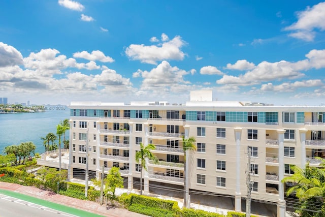 view of building exterior featuring a water view