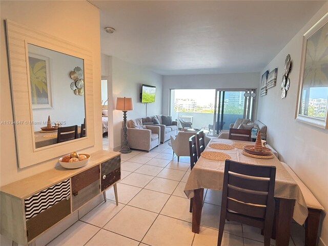 3 Island Ave Unit 07B, Miami Beach, FL 33139 - dining space with light tile patterned flooring