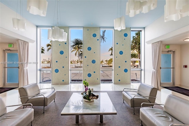 3 Island Ave Unit 07B, Miami Beach, FL 33139 - tiled living area with expansive windows