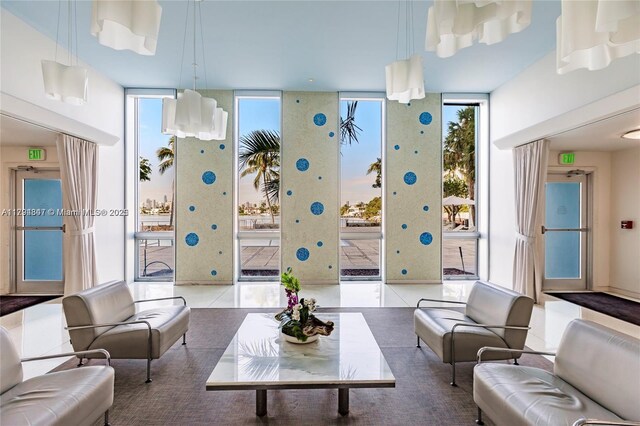 3 Island Ave Unit 07B, Miami Beach, FL 33139 - tiled living area with expansive windows